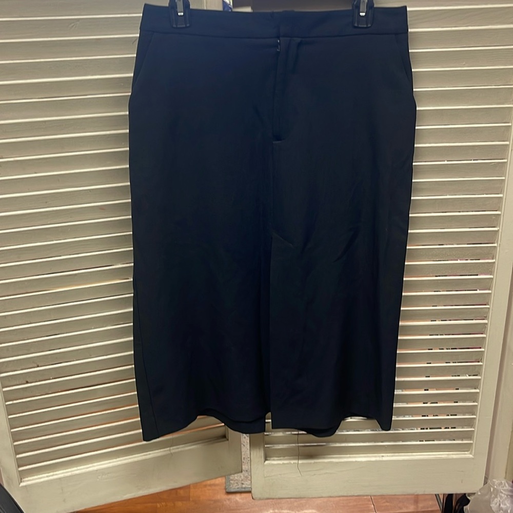 Bebe mid length skirt with double slid